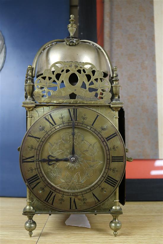 A lantern clock with later movement height 39cm